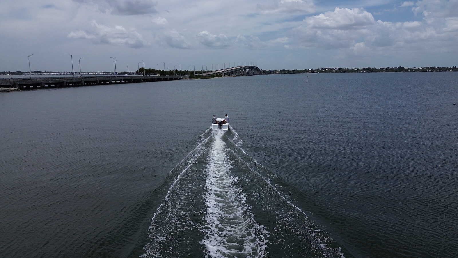 Cape Cat 115 with a wake trail, aerial view