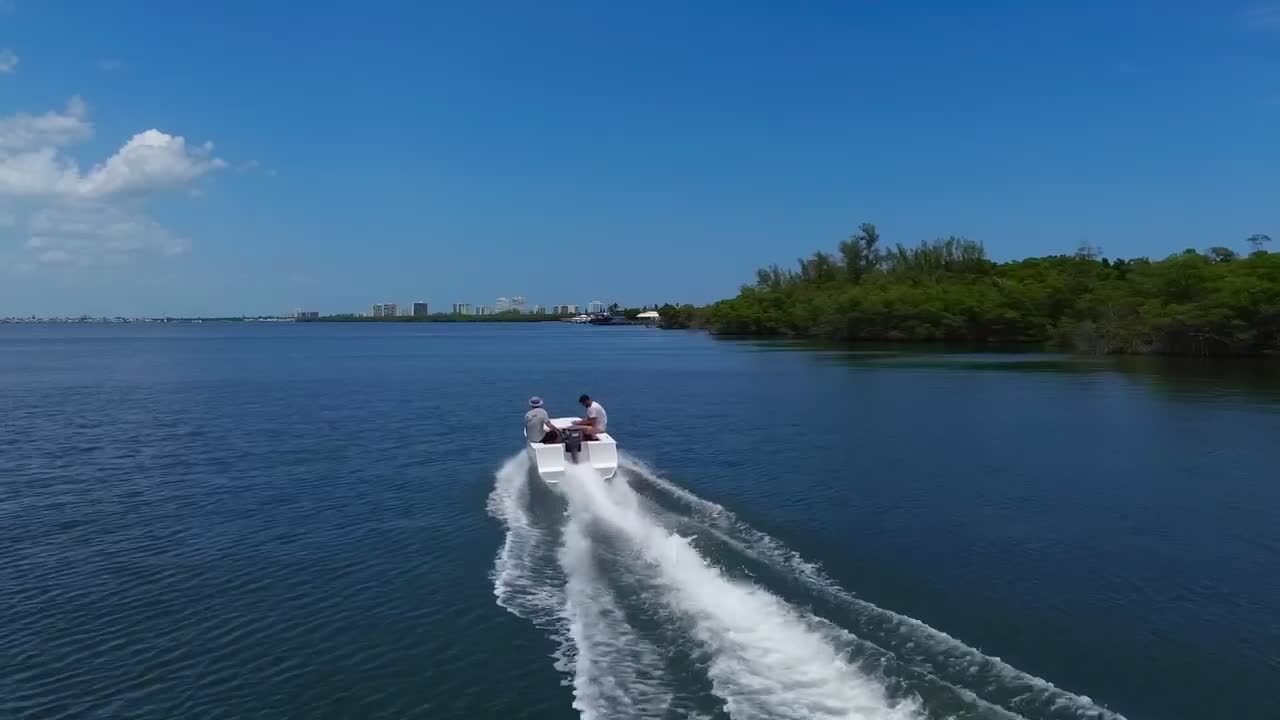 A Cape Cat 115 underway on the bay, aerial view