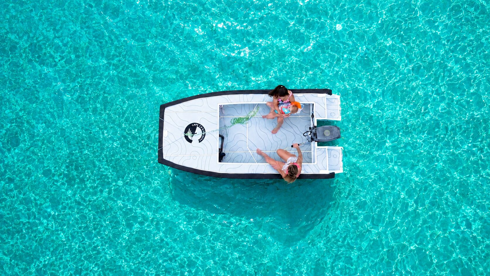 Two aboard a Cape Cat 115, seen from directly overhead