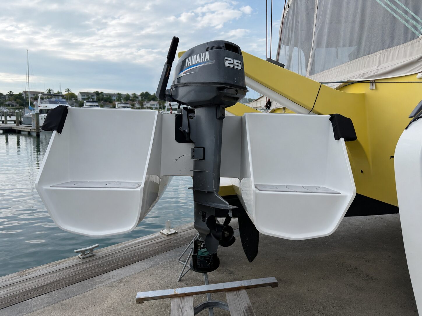 Cape Cat 115 stowed on the davits of her mothership, stern view
