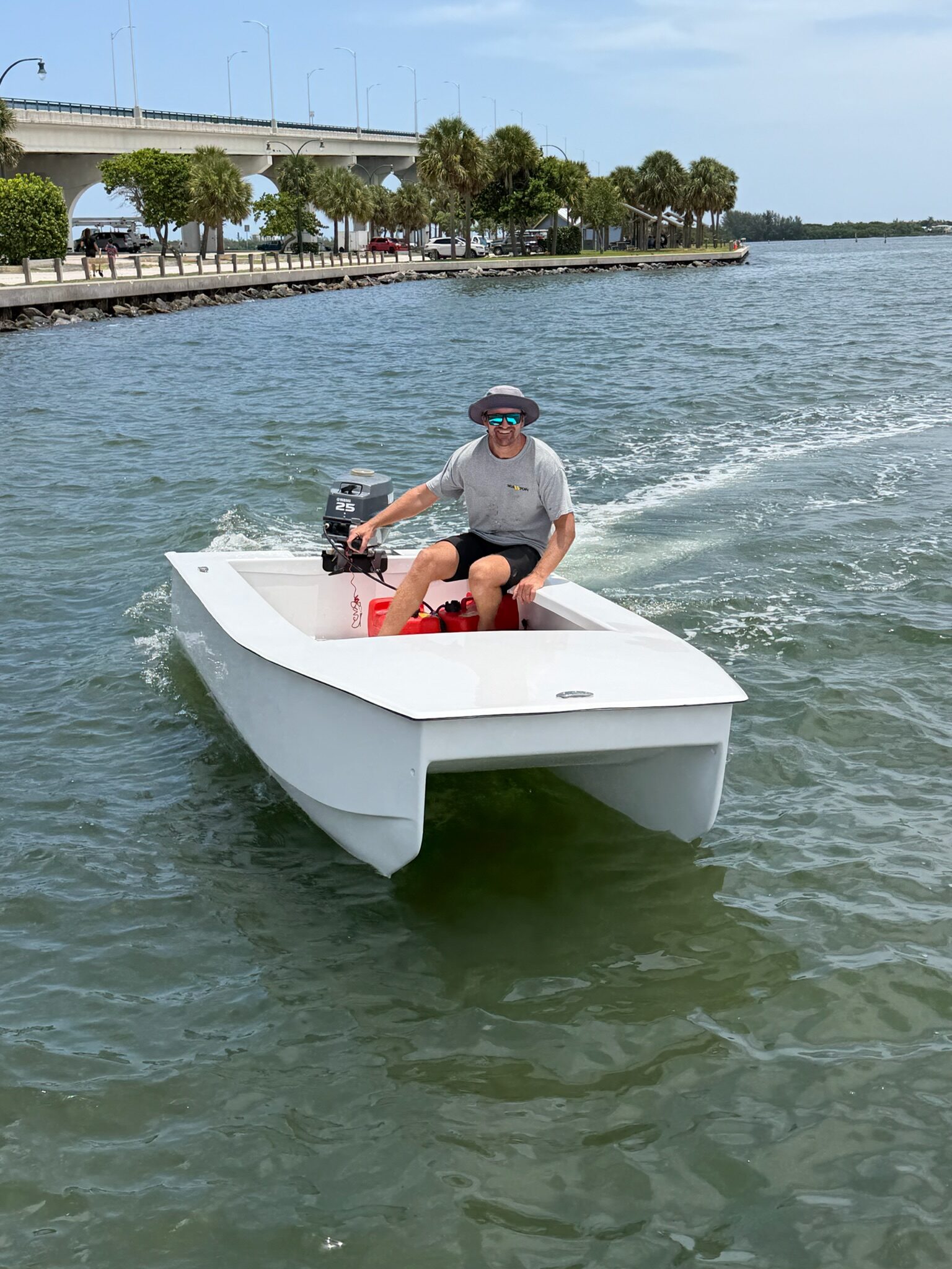 Cape Cat 115 running in bow-on beneath the causeway